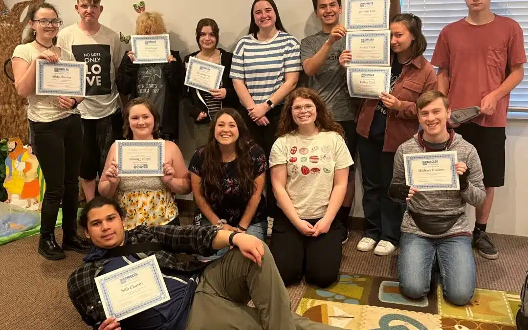 Circle teens class and showcasing last class teens in picture holding certificates